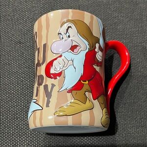 Preowned Grumpy Character Mug with Red Handle